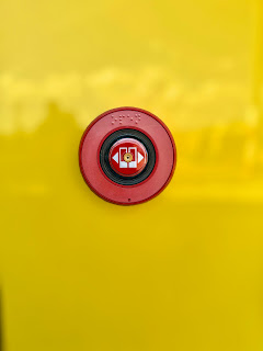 Image of emergency lighting illuminating an exit sign by Eastman Childs